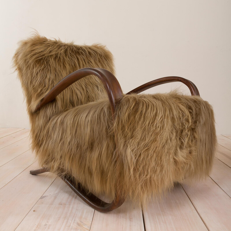 Vintage lounge chair in long hair sheepskin Halabala 269, 1930s