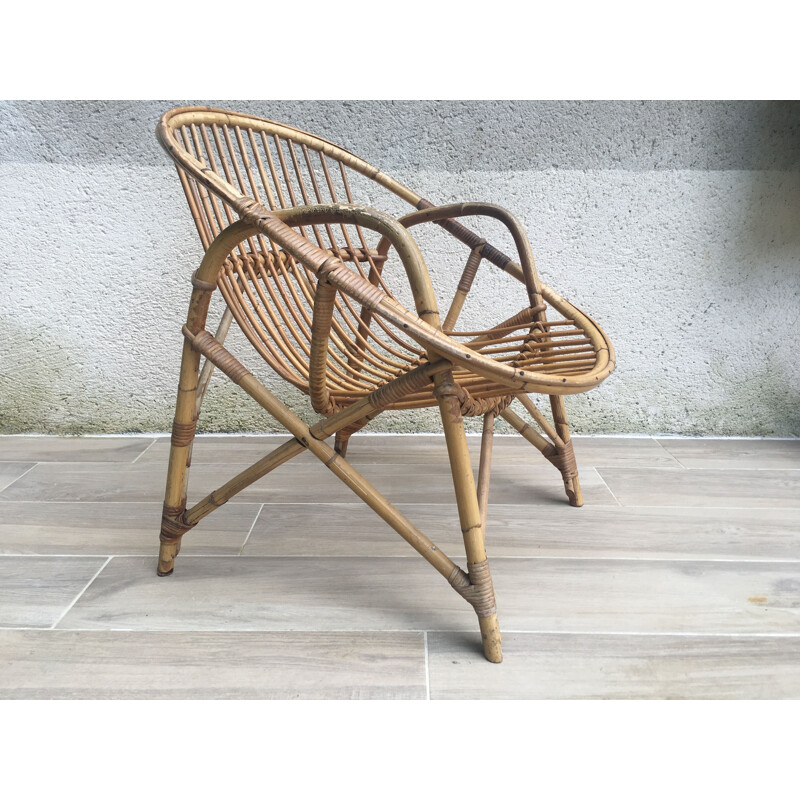 Fauteuil vintage Coquille Rotin