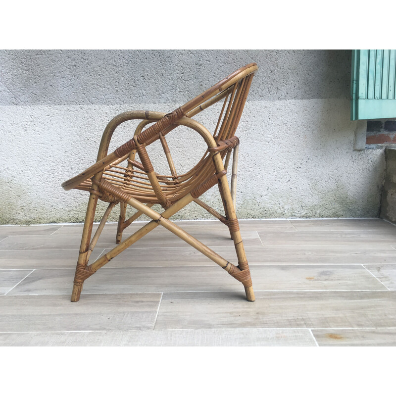 Fauteuil vintage Coquille Rotin