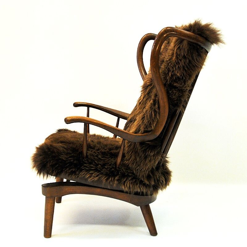 Vintage Rocking Sheep skin chair by Peter Hvidt, Denmark 1940s