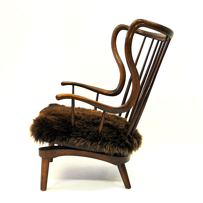 Vintage Rocking Sheep skin chair by Peter Hvidt, Denmark 1940s