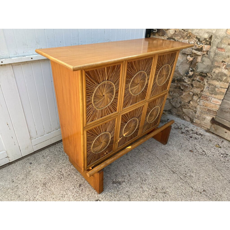 Vintage wooden bar counter and wicker wicker decorations 1960