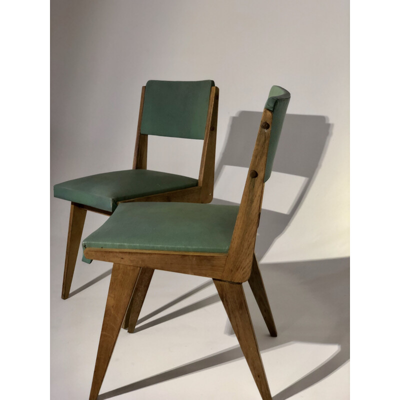 Pair of vintage chairs in leatherette and wood 