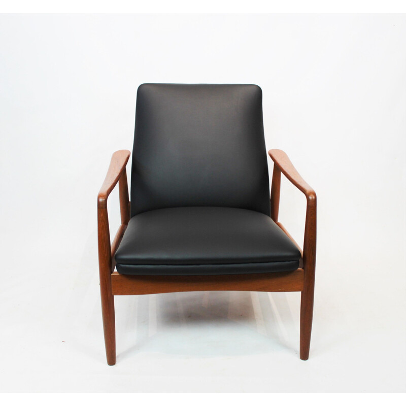 Vintage Easy chair in teak and black leather designed by Søren Ladefoged 1960s