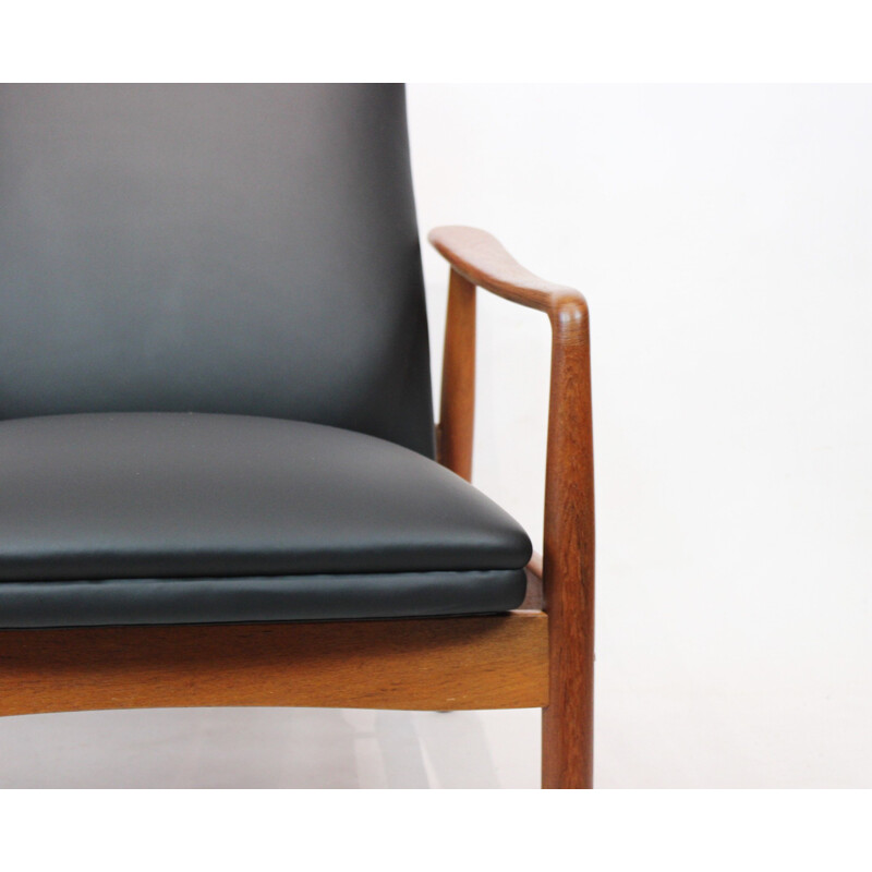 Vintage Easy chair in teak and black leather designed by Søren Ladefoged 1960s