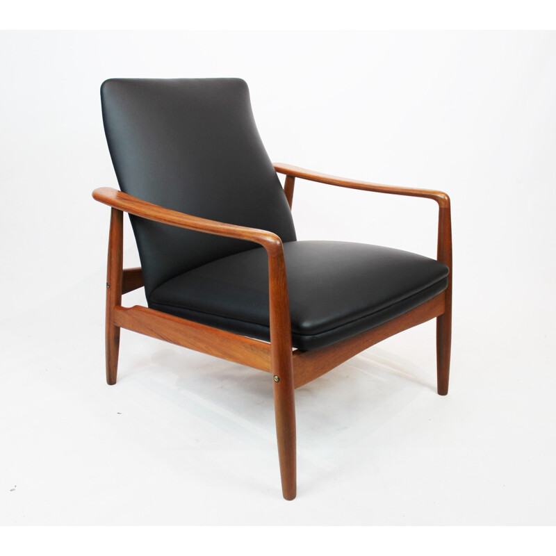 Vintage Easy chair in teak and black leather designed by Søren Ladefoged 1960s