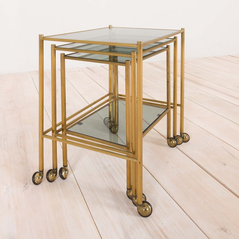 Vintage brass nesting tables on wheels, French 1960s