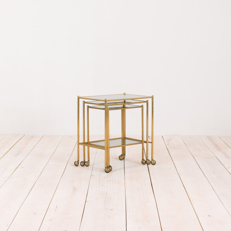 Vintage brass nesting tables on wheels, French 1960s