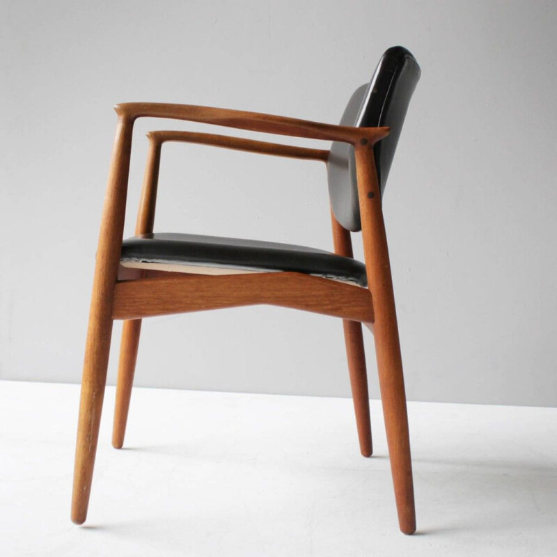 Poltrona vintage in teak e pelle modello SJ 67 di ERIK BUCH per Ørum Møbler, Danimarca 1950