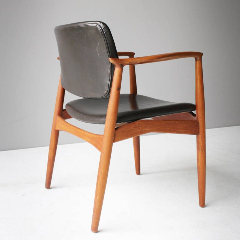 Poltrona vintage in teak e pelle modello SJ 67 di ERIK BUCH per Ørum Møbler, Danimarca 1950