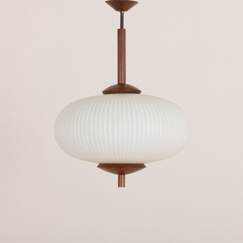 Large vintage ribbed opaline glass and teak pendant lamp of Louis Kalff, 1960s