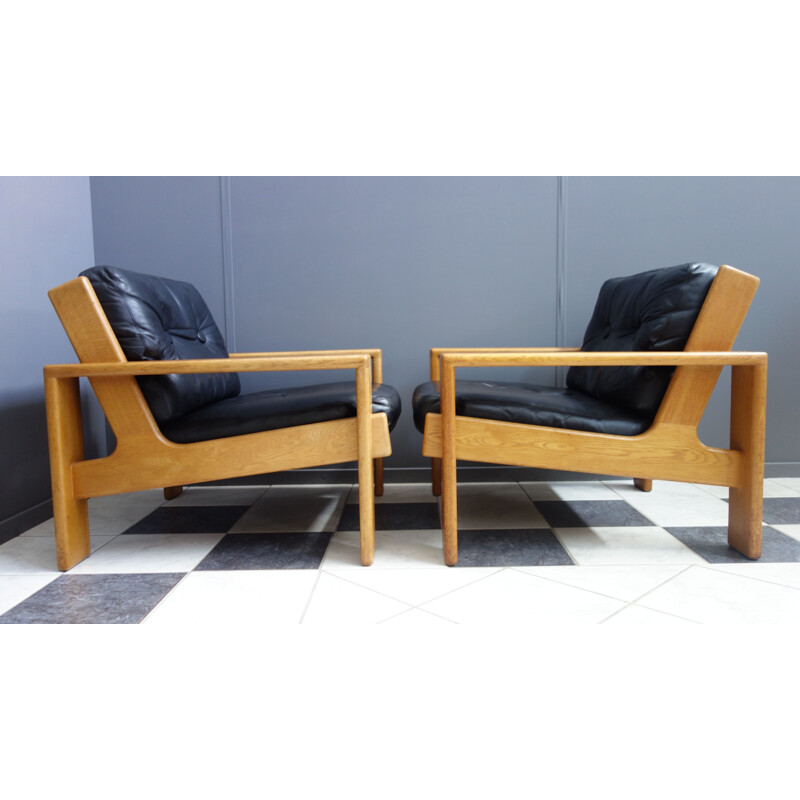 Pair of vintage chairs by Esko Pajamies in Leather and Oak model Bonanza 1960s