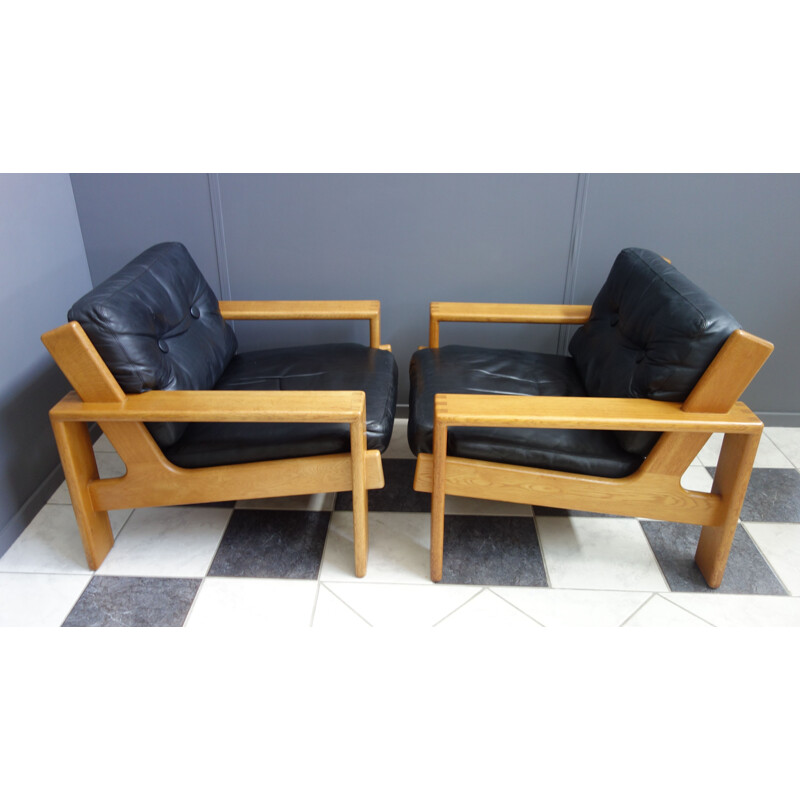 Pair of vintage chairs by Esko Pajamies in Leather and Oak model Bonanza 1960s