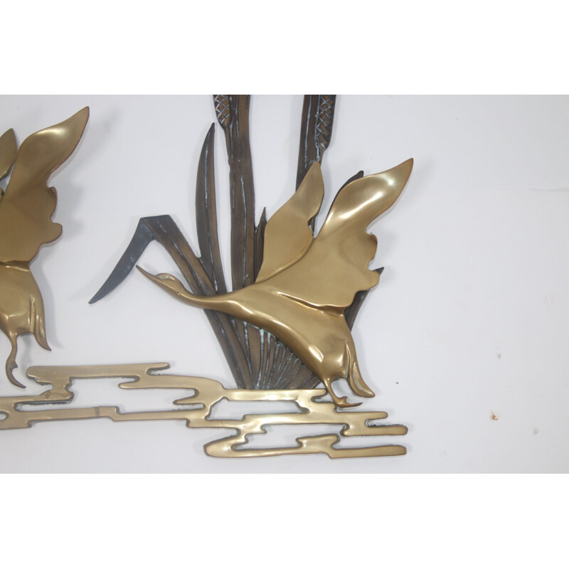 Vintage Flying ducks from the reeds made of copper