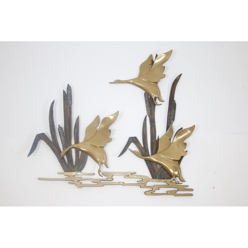 Vintage Flying ducks from the reeds made of copper