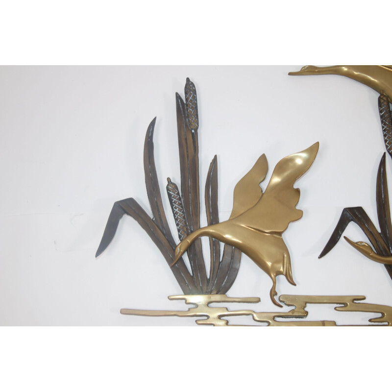 Vintage Flying ducks from the reeds made of copper