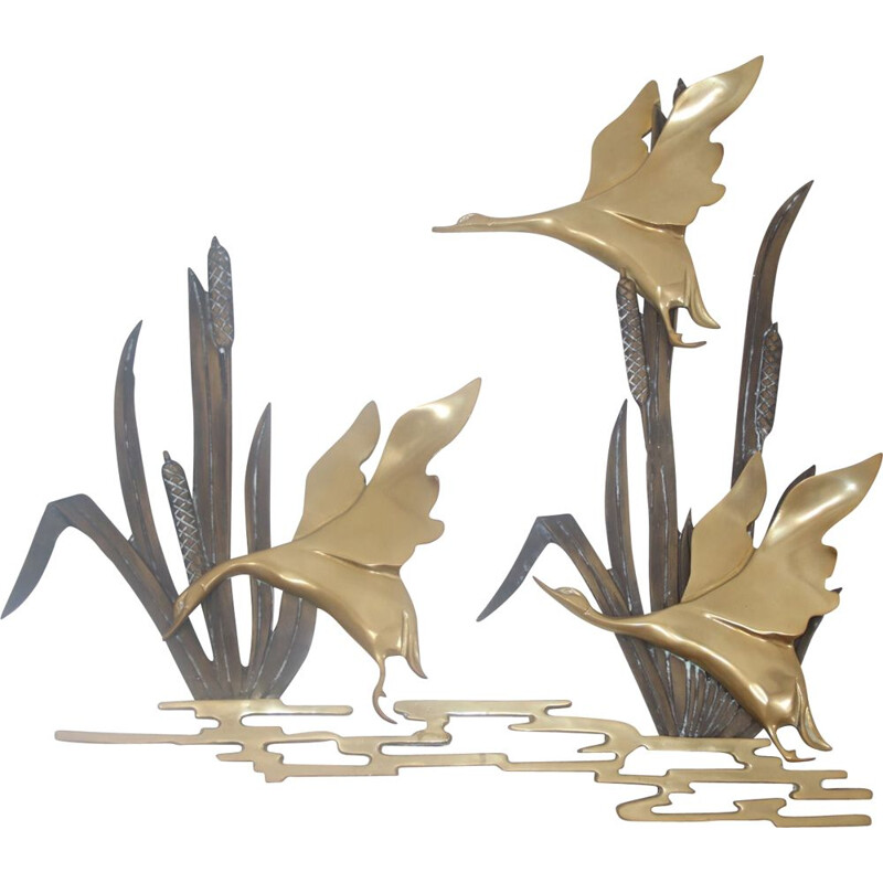 Vintage Flying ducks from the reeds made of copper