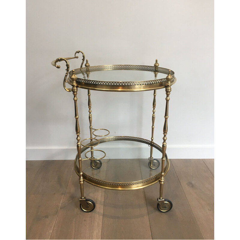 Vintage brass and glass table on wheels, 1940