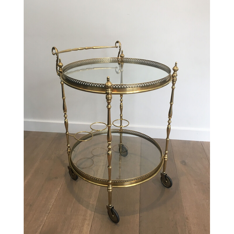 Vintage brass and glass table on wheels, 1940