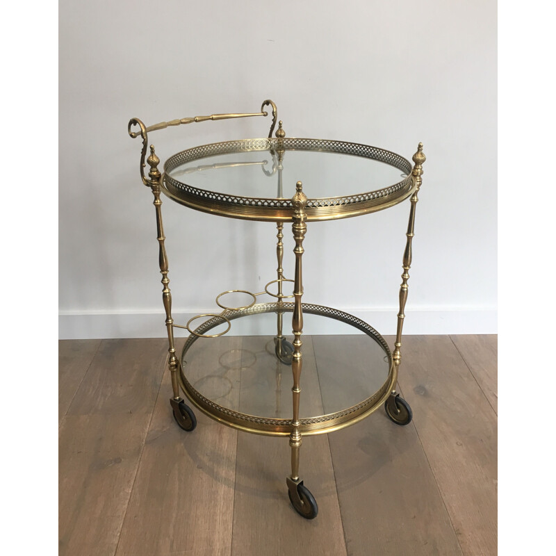 Vintage brass and glass table on wheels, 1940