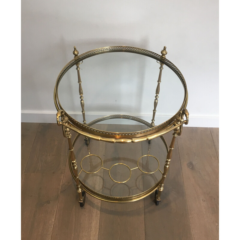 Vintage brass and glass table on wheels, 1940