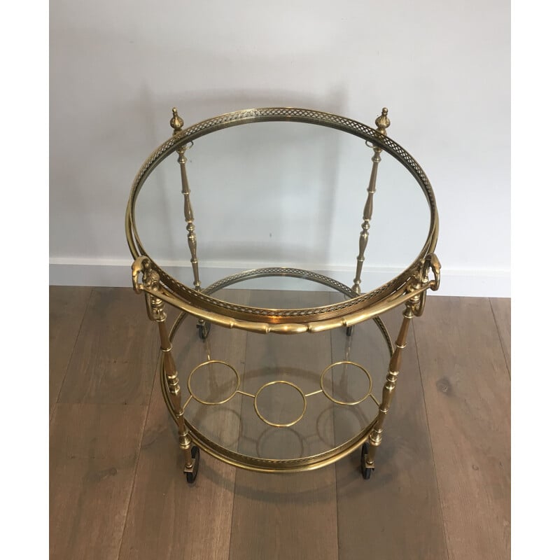 Vintage brass and glass table on wheels, 1940