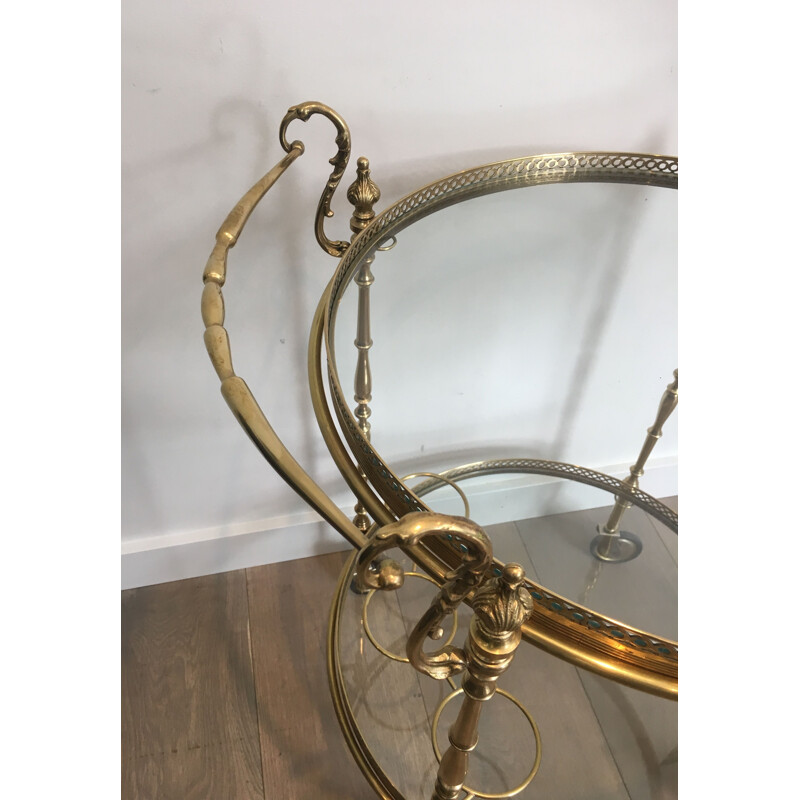 Vintage brass and glass table on wheels, 1940