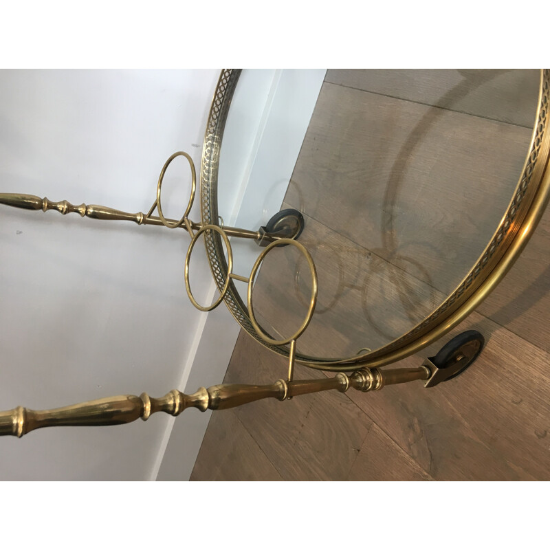 Vintage brass and glass table on wheels, 1940