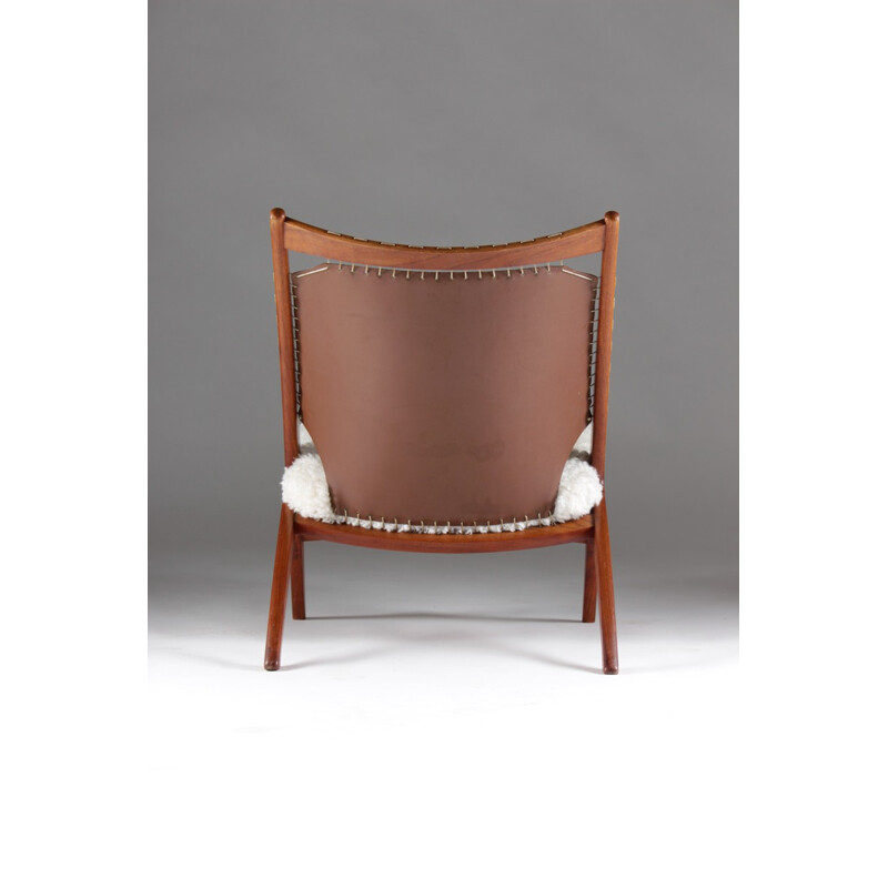 Krysset low chair in leather and sheepskin, Frederik KAYSER - 1950s