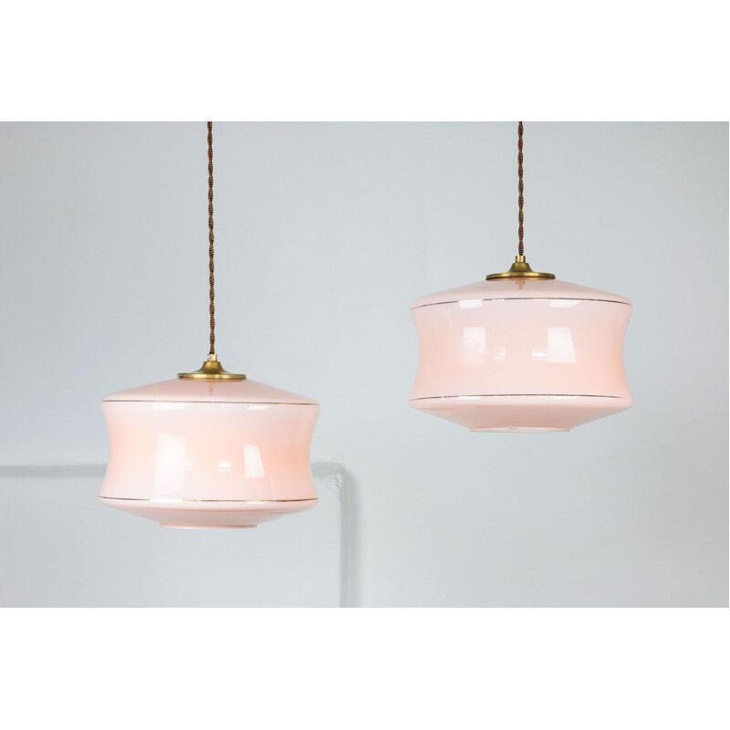 Pair of Mid-century pink glass & brass pendant lamps
