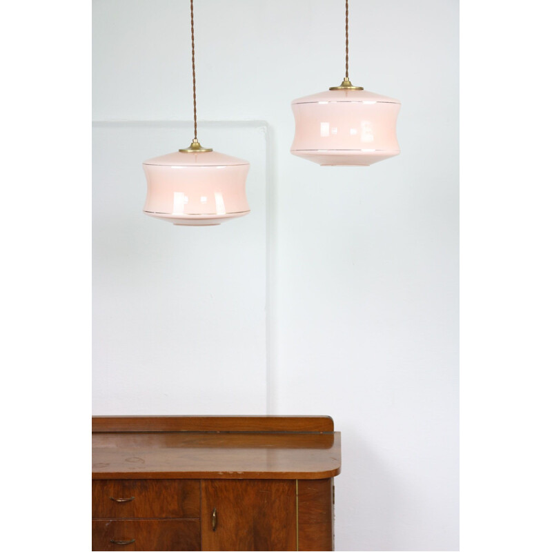 Pair of Mid-century pink glass & brass pendant lamps