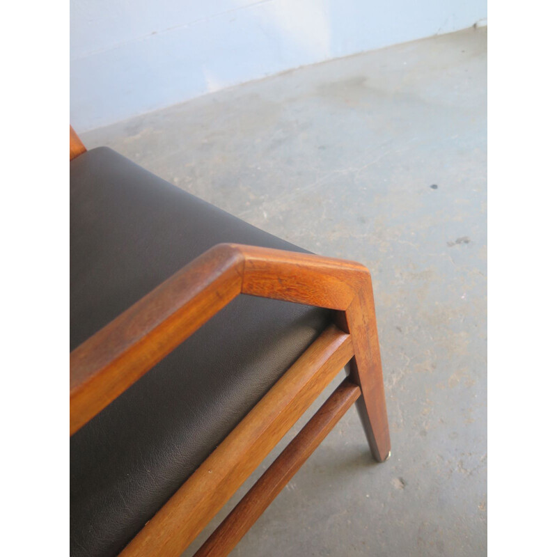 Vintage Chair in black leather and wood 1960s