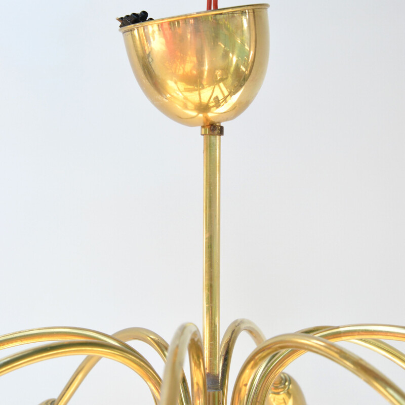 Vintage 8-arm brass chandelier in the style of Stilnovo, Italy, 1970s
