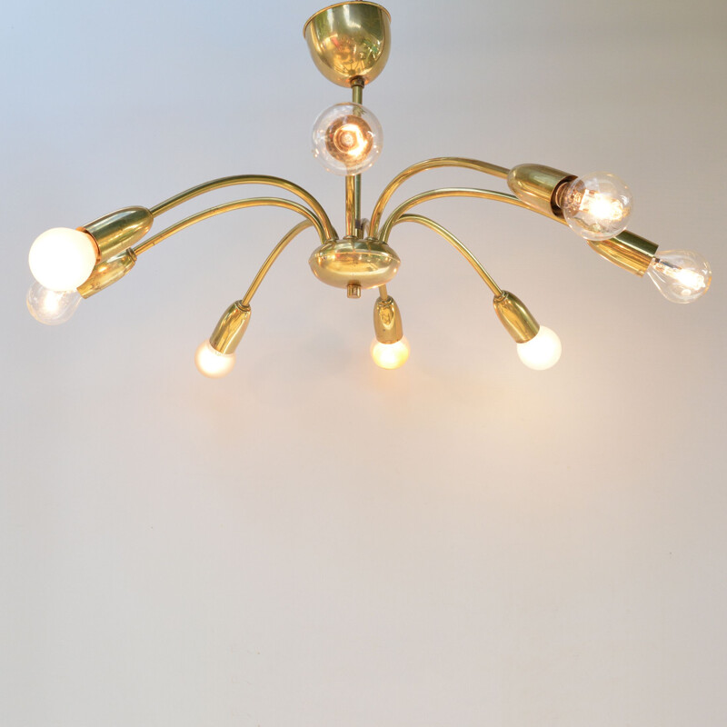 Vintage 8-arm brass chandelier in the style of Stilnovo, Italy, 1970s