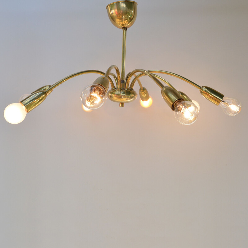 Vintage 8-arm brass chandelier in the style of Stilnovo, Italy, 1970s