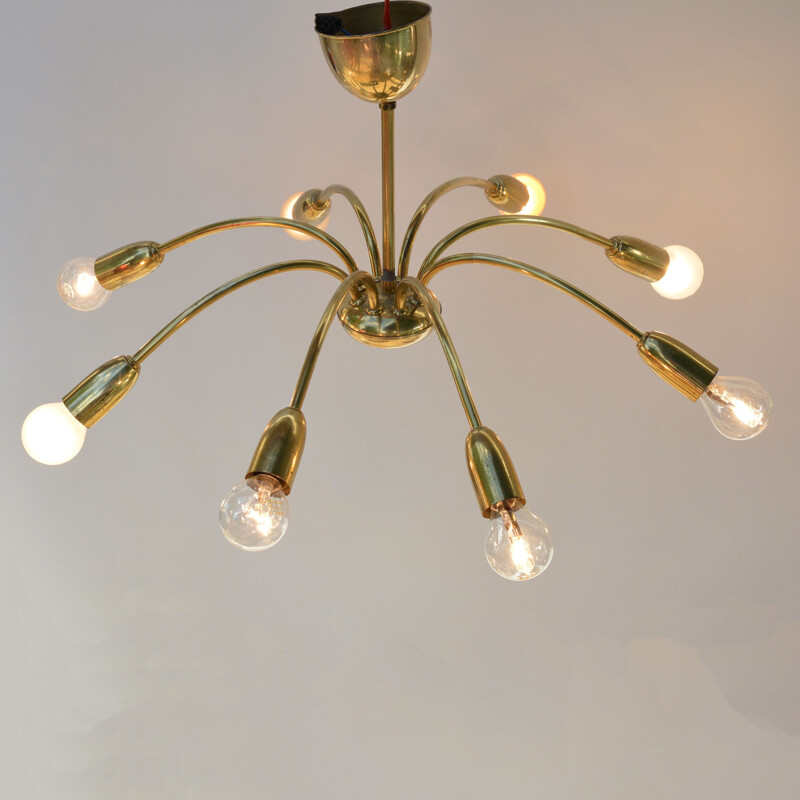 Vintage 8-arm brass chandelier in the style of Stilnovo, Italy, 1970s