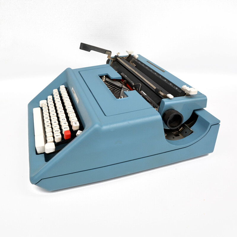 Vintage Olivetti studio 46 suitcase typewriter designed by M. Bellini Spain 1970s