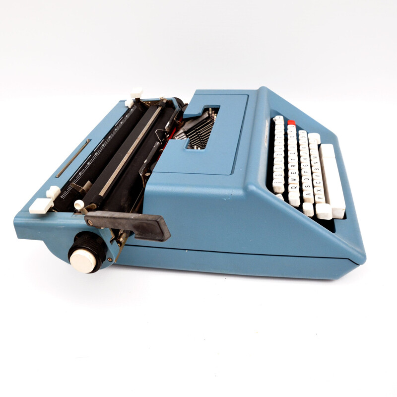 Vintage Olivetti studio 46 suitcase typewriter designed by M. Bellini Spain 1970s