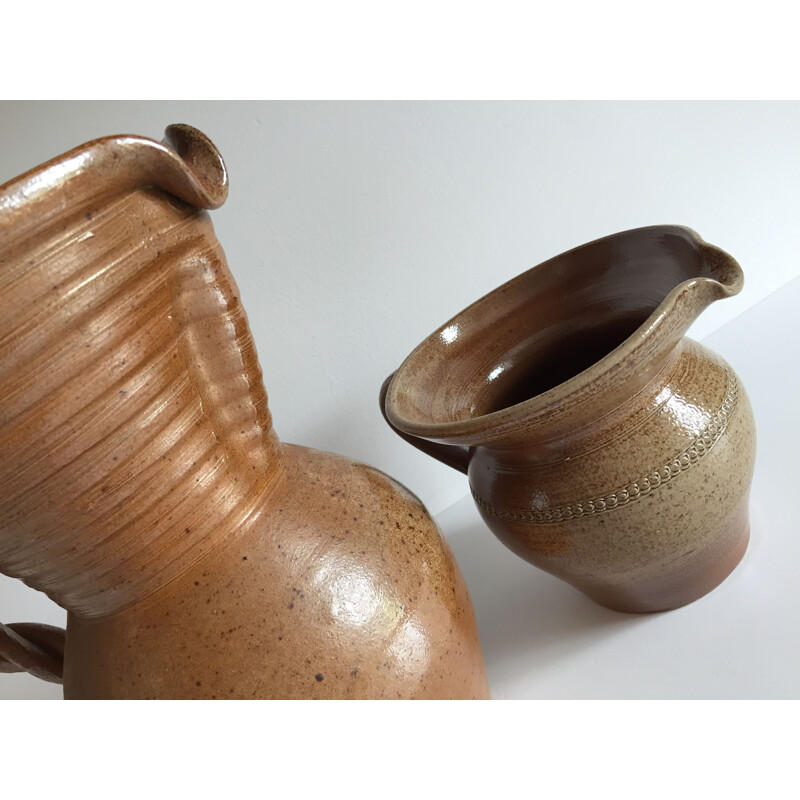 Set of 2 vintage pitchers in enamelled gres