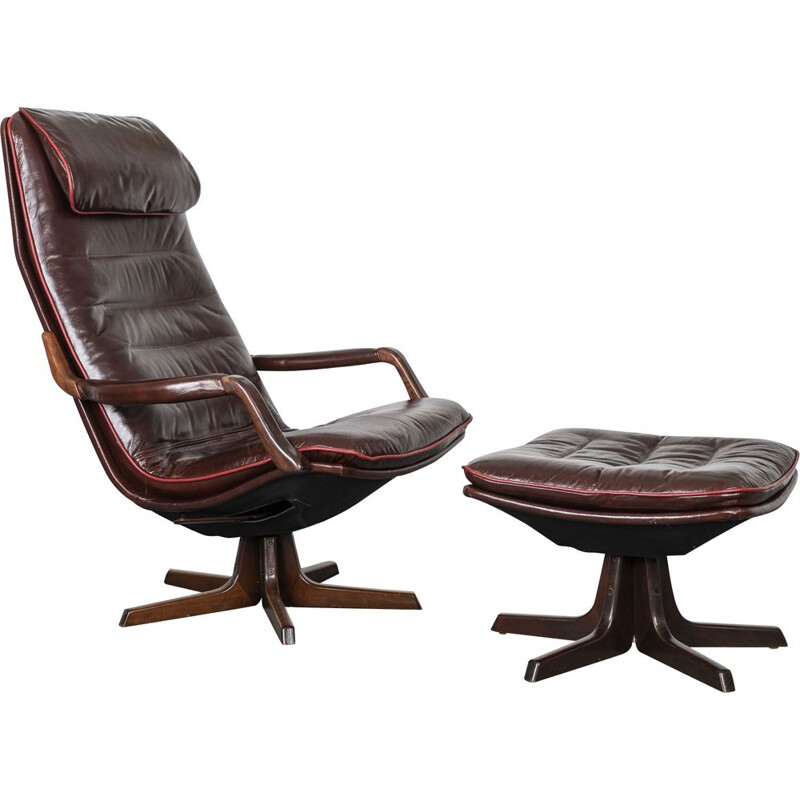 Vintage Reclining leather chair with matching foot stool. By Berg Furniture, Denmark. 1970s