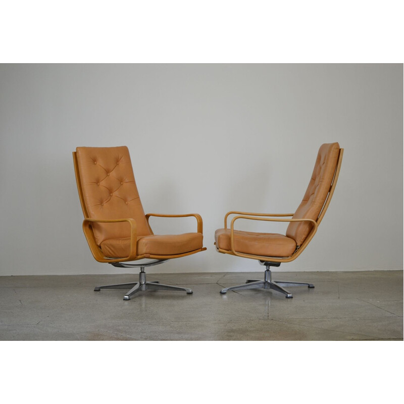 Pair Of vintage Swiveling Leather Armchairs By Alf Svensson And Yngvar Sandström 1960s