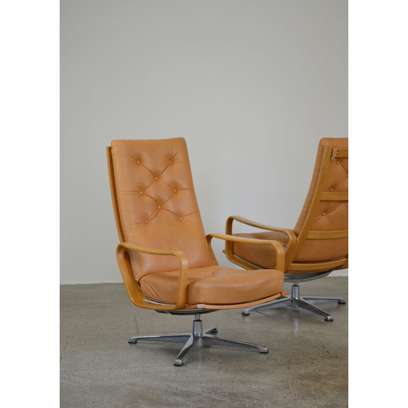 Pair Of vintage Swiveling Leather Armchairs By Alf Svensson And Yngvar Sandström 1960s