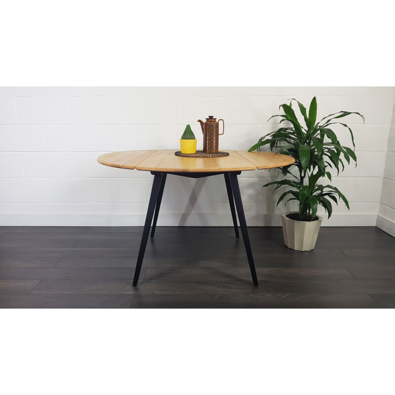 Ercol Round Drop Leaf Dining Table - Black Leg, 1960s