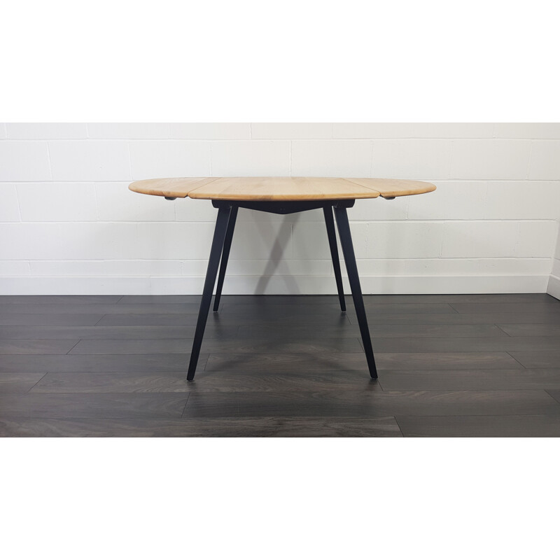 Ercol Round Drop Leaf Dining Table - Black Leg, 1960s