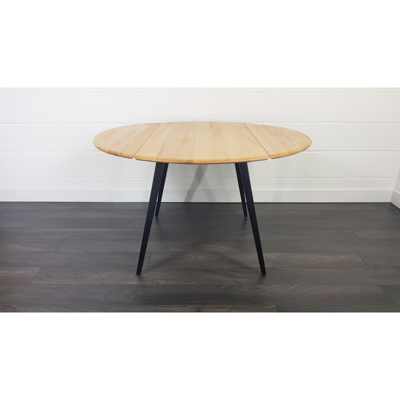 Ercol Round Drop Leaf Dining Table - Black Leg, 1960s