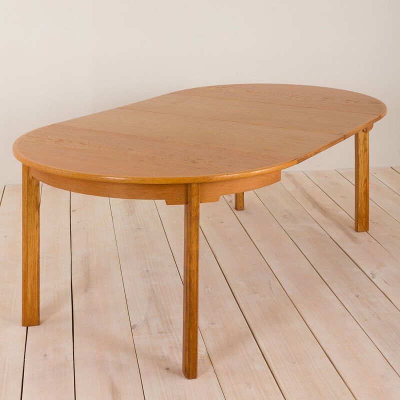 Vintage Danish round oak extension table with two leaves to Borge Mogensen 1960