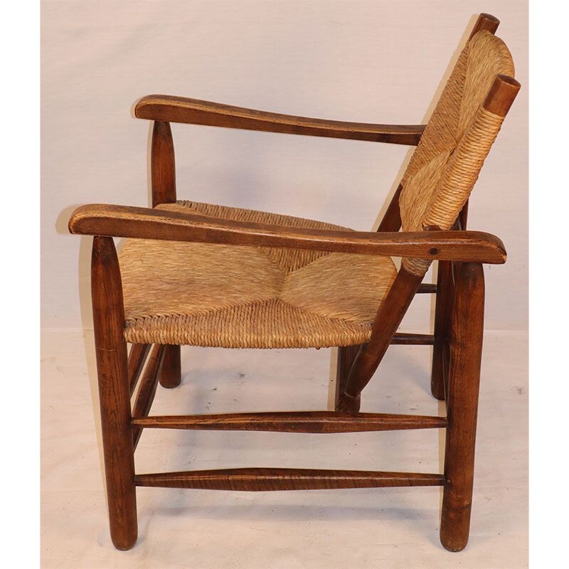 Vintage straw armchair by Charlotte Perriand 1930s