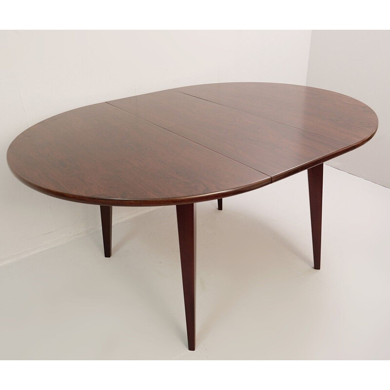 Vintage Italian rosewood circular extensible dining table 