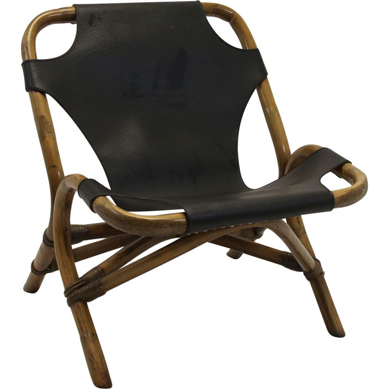 Fauteuil relax vintage en rotin avec assise en cuir noir