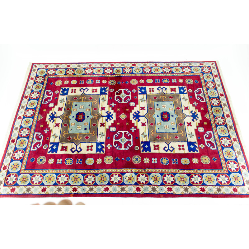 Hand-knotted vintage Kazak rug with geometric patterns, 1960